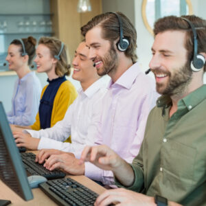 Customer service executives working in call center Team of customer service executives working in call center